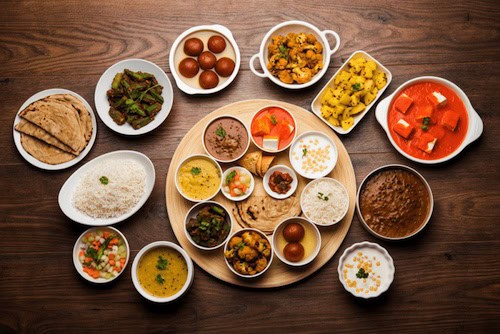 Flavor of India dishes arrayed on a table