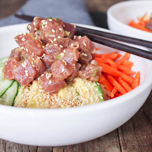 Poke bowl with carrots and sesame seeds