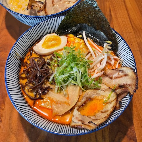 Kopan Ramen two bowls on a wood table