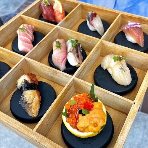 Wood bento box of sushi from Kopan Ramen