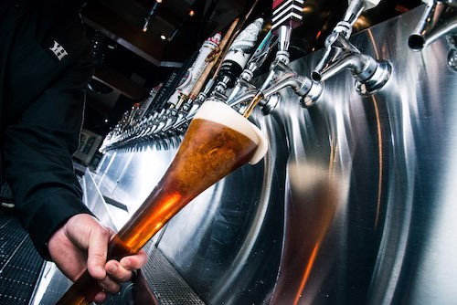 Yard House beer pour from a tap
