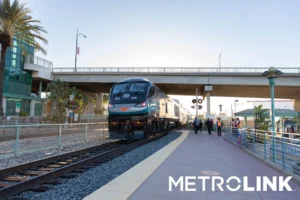 Metrolink train image on track with blue sky