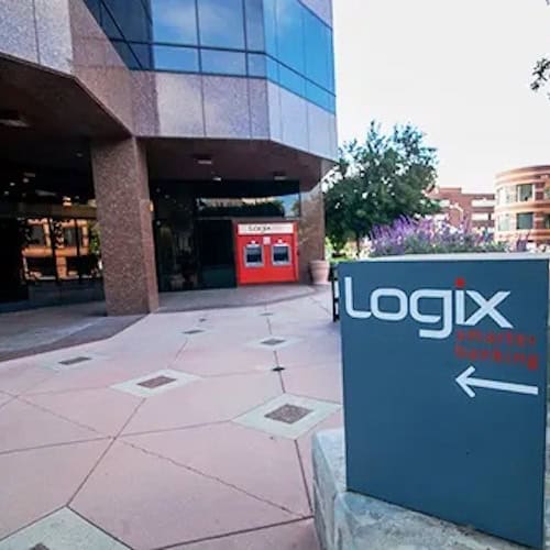 Logix Federal Union sign with arrow outside brown building