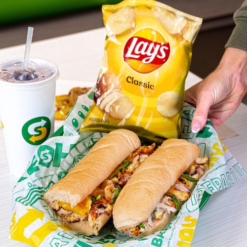 Subway 6" subs with Lays potato chips and soda