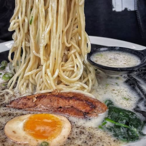 Silverlake Ramen bowl with noodles being pulled up