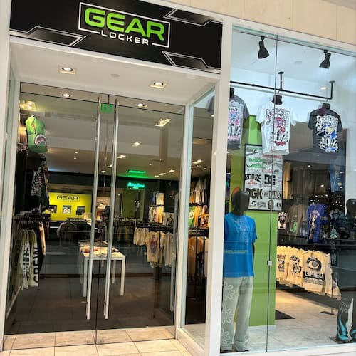 Front entrance of Gear Locker store in the mall with window display.