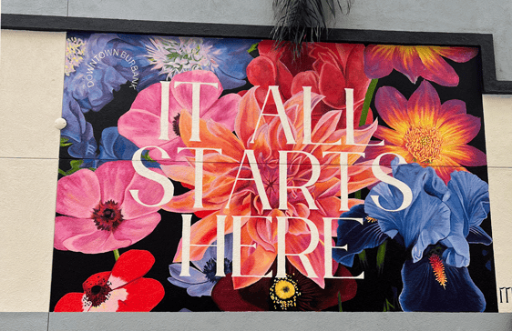 "It All Starts Here" wall mural