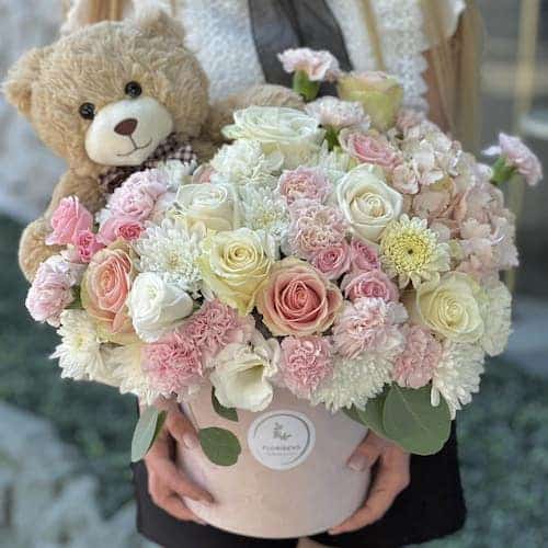 Floridens floral bouquet with pink and white flowers and teddy bear