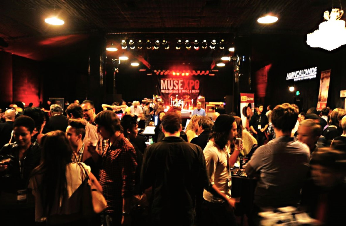 MUSEXPO event with stage and attendees